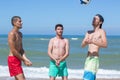 Boys playing beach volleyball Royalty Free Stock Photo