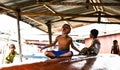 Boys playing in a boat Royalty Free Stock Photo