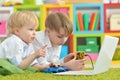 Boys playing computer games Royalty Free Stock Photo