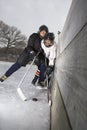 Boys playing ice hockey. Royalty Free Stock Photo