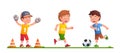 Boys playing soccer game together, kicking ball