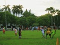 Boys playing soccer in the sports park in Jember, Indonesia