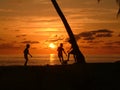 Boys Playing at sunset