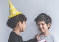 Boys playing together in birthday party Royalty Free Stock Photo