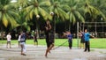 Boys are playing volleyball in the sports park in Jember, Indonesia