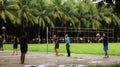 Boys are playing volleyball in the sports park in Jember, Indonesia