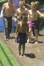 Boys playing with water balloons