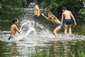 Boys playing water in a park,chengdu,china Royalty Free Stock Photo