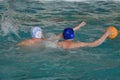 The boys play in water polo Royalty Free Stock Photo