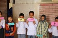 Boys playing words game at charity event