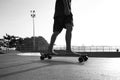 Boys practicing skateboarding during the sunset