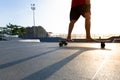 Boys practicing skateboarding during the sunset Royalty Free Stock Photo