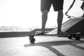 Boys practicing skateboarding during the sunset