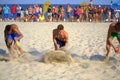 Boys racing on the beach