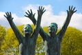 Boys reaching out. Street art in Oslo.