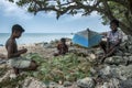 Boys repair a fishing net on Delft Island in the northern Sri Lankan region of Jaffna.