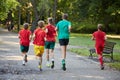 Boys running in park Royalty Free Stock Photo