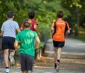 Boys running in park Royalty Free Stock Photo