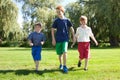 Boys running in park Royalty Free Stock Photo