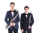 Boys with saxophone and clarinet Royalty Free Stock Photo