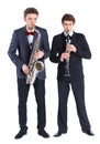 Boys with saxophone and clarinet Royalty Free Stock Photo