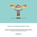 Boys scout holding a semaphore flags