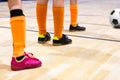 Boys in Soccer Clothes with Soccer Futsal Ball. Kid on indoor soccer training