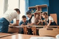 Friendly kids occupied during the break at school Royalty Free Stock Photo