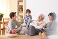 Boys talking with grandparents