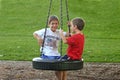 Boys on Tire Royalty Free Stock Photo