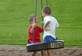 Boys on Tire Swing Royalty Free Stock Photo