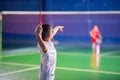 Boys training badminton indoor activity sport