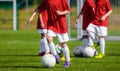 Boys Training Soccer on the Soccer Field. Children Football Training