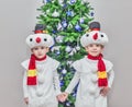 Boys, twins in carnival costumes of snowmen Royalty Free Stock Photo