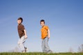 Boys Walking on a Hill