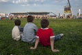 Boys watch the wrestling action at Izmit in Turkey.