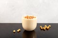 Boza or Bosa, traditional Turkish fermented drink with roasted chickpea. Selective focus, copy space