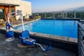 BOZEMAN, MONTANA, USA Ã¢â¬â JULY 17, 2021: Armory Hotel rooftop pool with disabled access crane chair Royalty Free Stock Photo