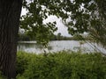 Bozi di Saudino, Sarzana, Italy. Former gravel pits, now nature reserve. Glimpsed here through trees.