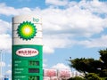 BP plc British oil and gas company signage, brand logo, gas station signpost emblem object extreme closeup, detail, nobody