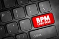 BPM lifecycle text on keyboard button representing business process stages, management cycle, continuous improvement, workflow Royalty Free Stock Photo
