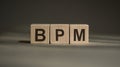 BPM written on wooden cube