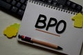 BPO - Business Process Outsourcing write on a book isolated on office desk Royalty Free Stock Photo