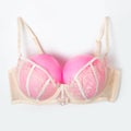 Bra with pink balloons on a gray background. Fun, conceptual photo, great big breasts Royalty Free Stock Photo