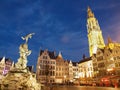 Brabo Statue And Cathedral In Antwerp At Night