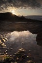 Bracelet Bay and Mumbles lighthouse sunrise Royalty Free Stock Photo