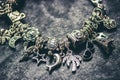 Bracelet with charms. Royalty Free Stock Photo