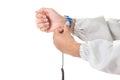 Bracelet on the hand of a man wearing ESD cloth isolated on whit