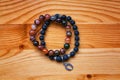 Bracelet of lava stone and a stone agate Royalty Free Stock Photo