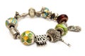 Bracelet with many accessories, luck, money, an owl